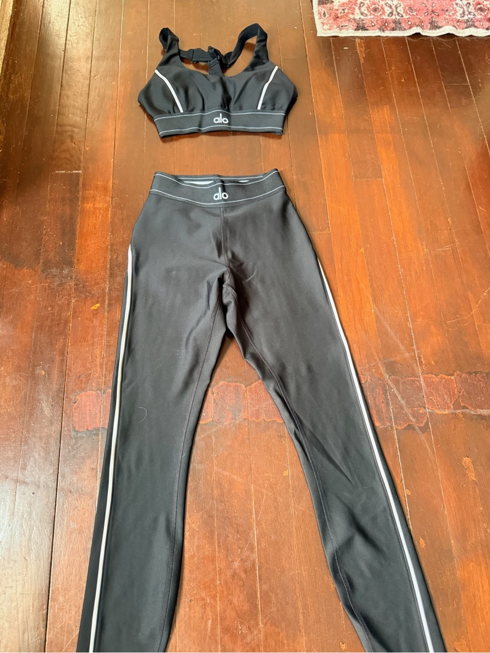 ALO Yoga Black Leggings and Matching Sports Bra with White Piping
